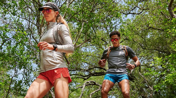 Trail runners wearing Garmin Fenix 7 watches