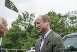 Prince William takes part in a walkabout