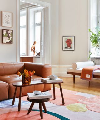 Retro living room with a brown sofa and patterned rug