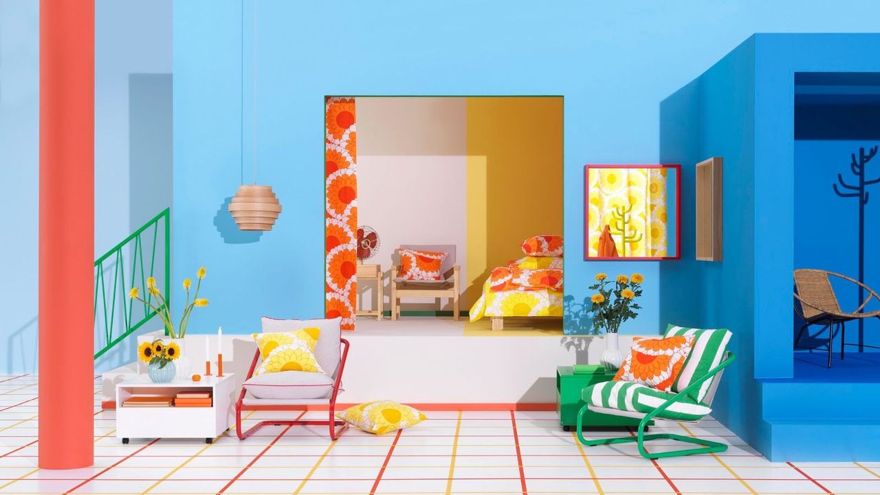 A spread of IKEA&#039;s new Nytillverkad furniture launch, with bright colored furniture in a bright blue room