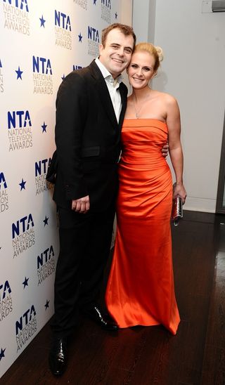 Simon and his wife Emma (Ian West/PA)