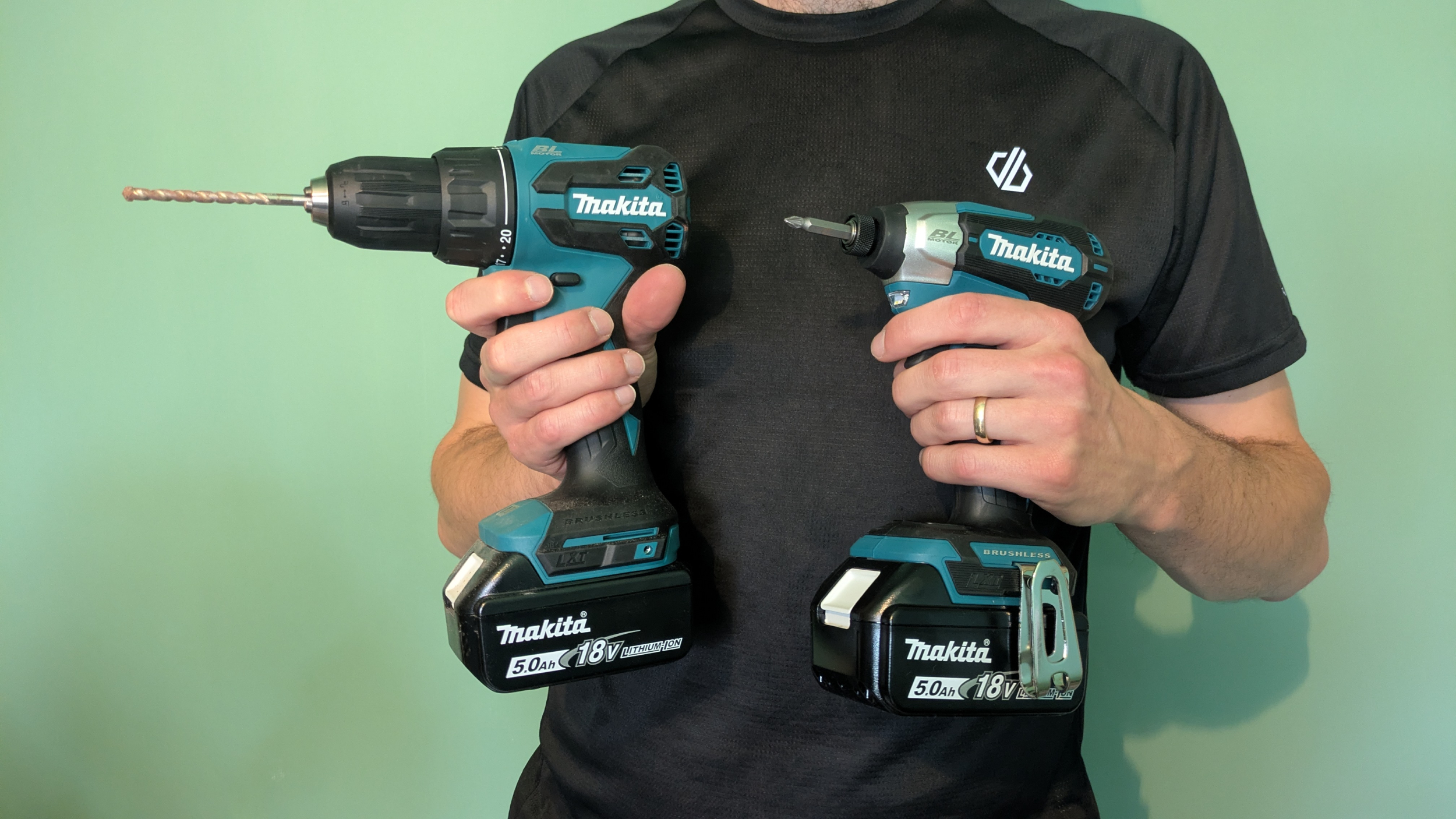 A Makita cordless drill and a Makita cordless impact driver held side by side