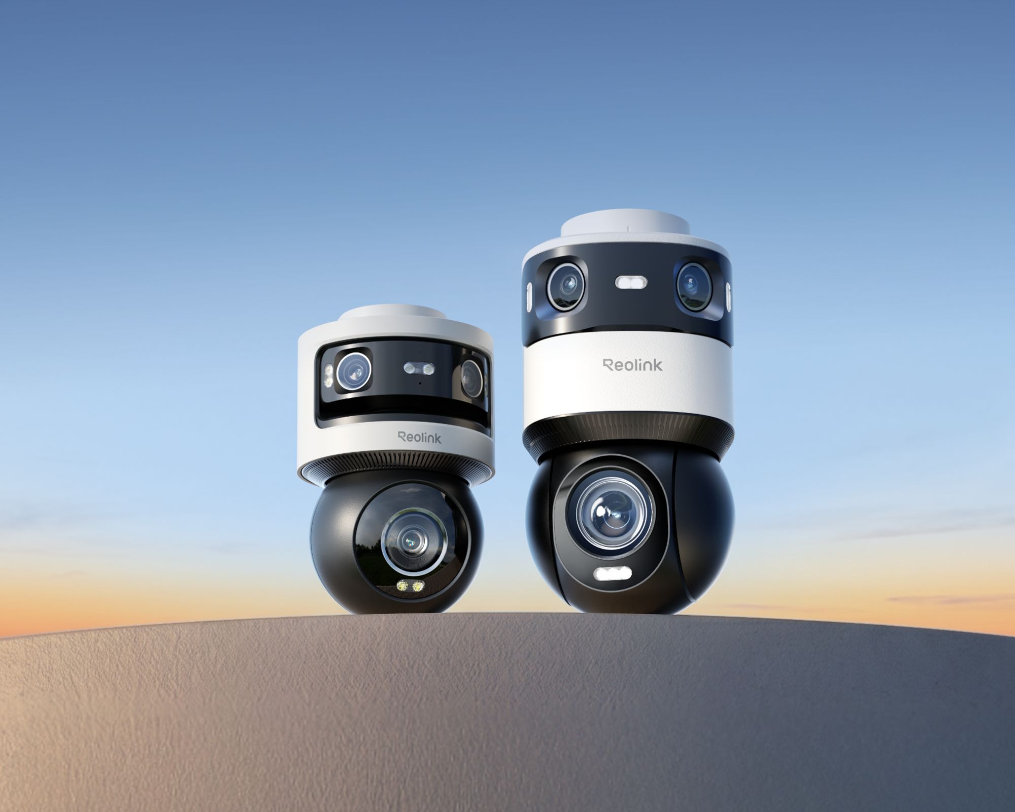 Two Reolink OMVI 3i PoE models on a curved white surface with a blue sky sunset behind.