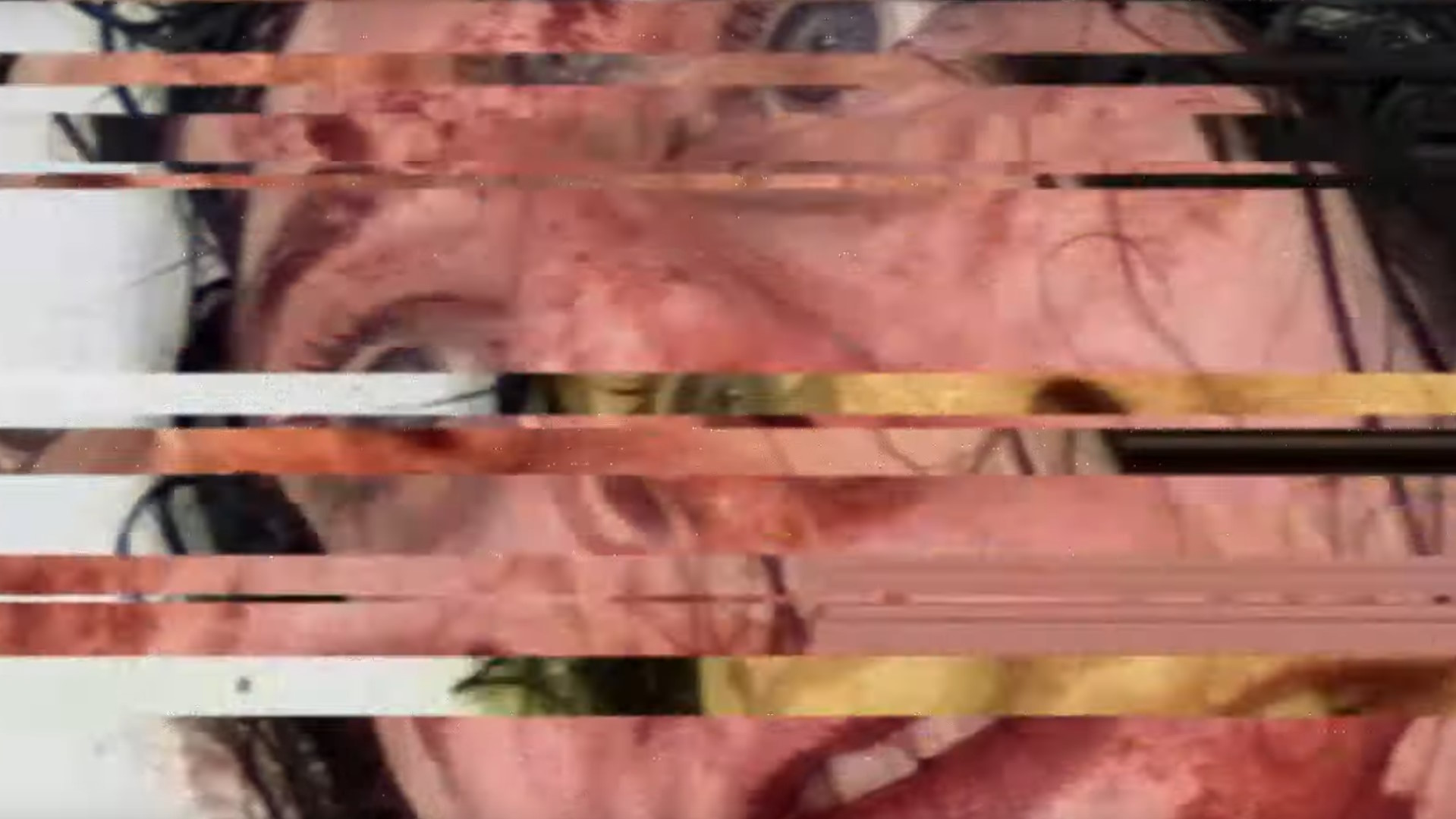 Vile: Exhumed trailer still - distorted face of a woman