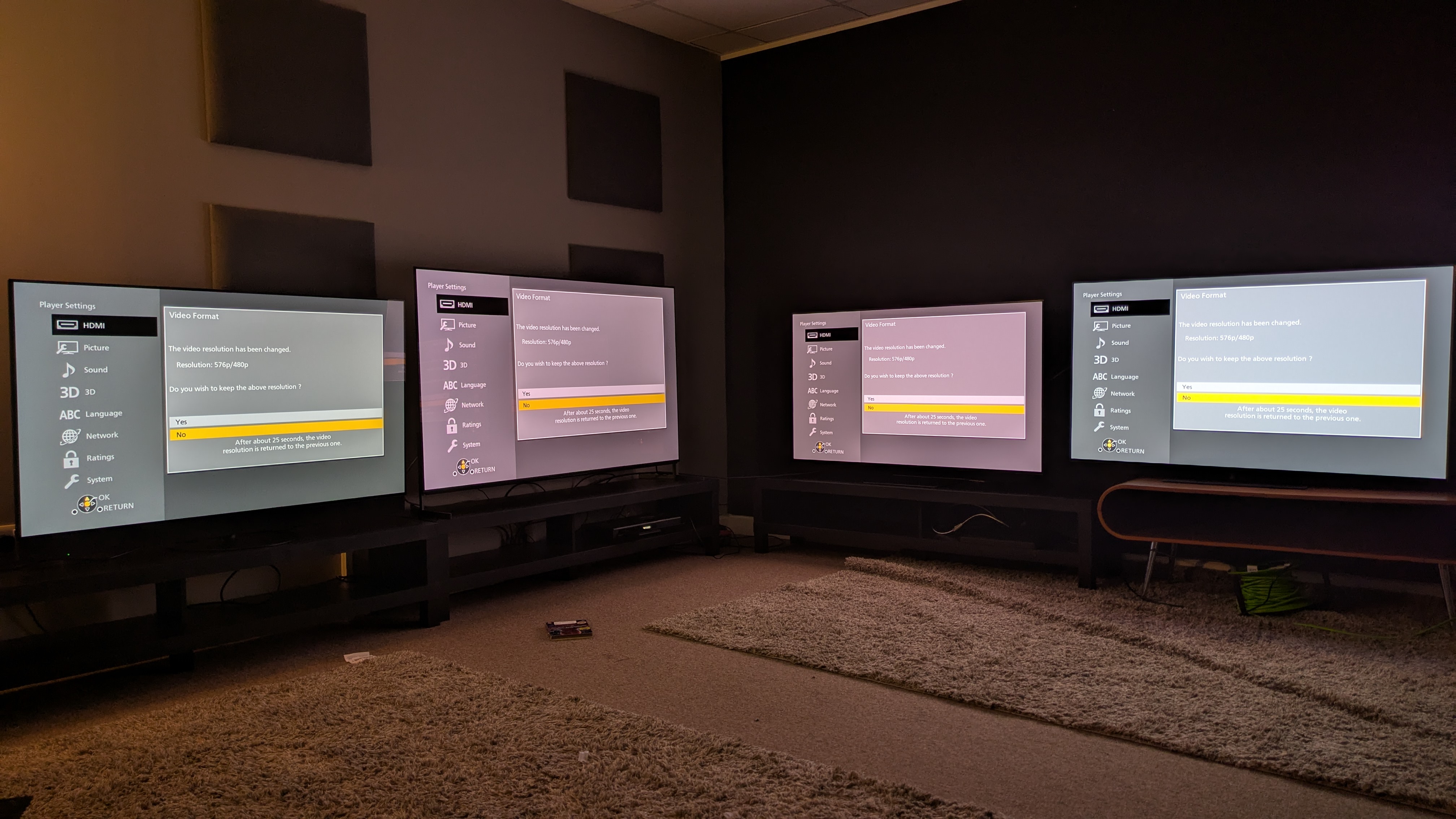 Panasonic Z95B (far left) Sony Bravia 8 II (middle left) Samsung S95F (middle right) LG G5 (far right) with UB820 settings page on screen