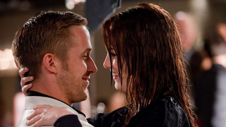 A scene in Crazy, Stupid, Love where Hannah and Jacob embrace affectionately in a bustling room.