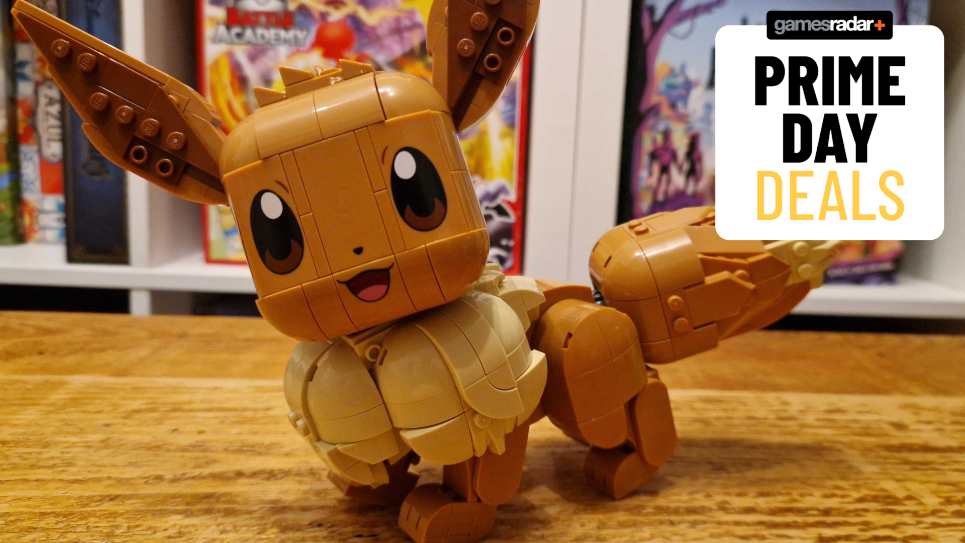 Lego Eevee set on a wooden table, behind a GamesRadar+ Prime Day deals badge
