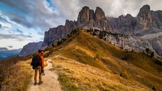 Man hiking alone on trail