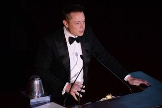 SpaceX's Elon Musk accepts the Explorers Club President's Award for Exploration and Technology at the Waldorf Astoria in New York on March 15, 2014 during the Explorers Club Annual Dinner.