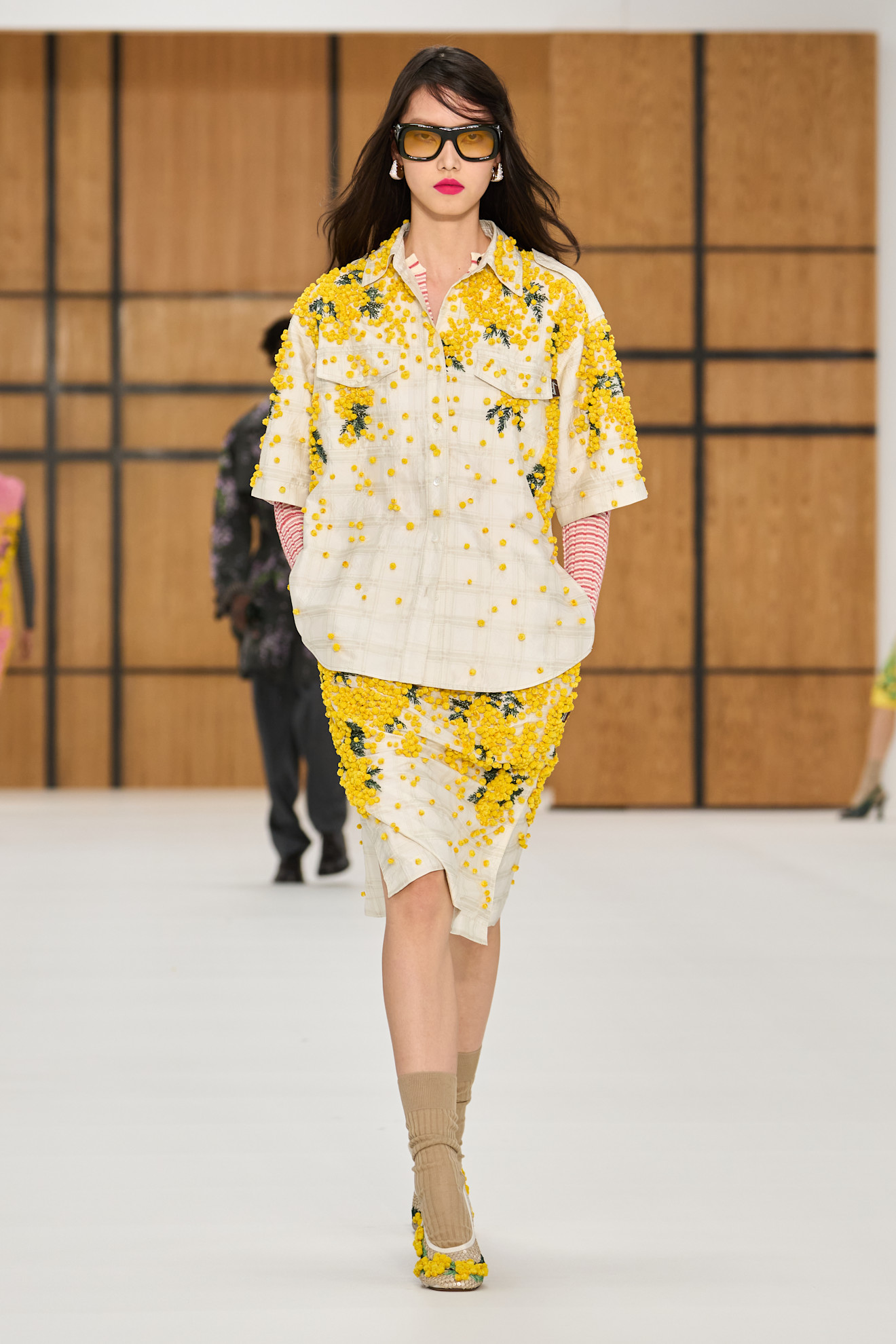 a model walks the spring/summer 2027 burberry runway.