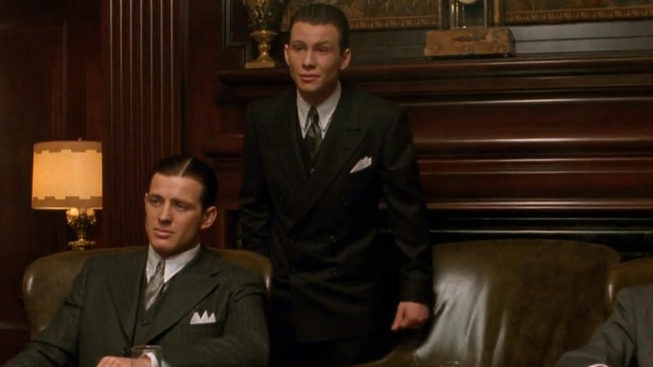 Christian Slater wearing a sharp suit in Mobsters.