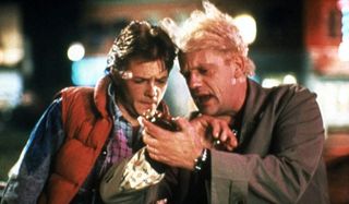 Marty and Doc checking their watches in Back To The Future.