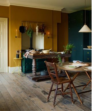 Blue and yellow kitchen designed by devol
