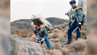 astronauts John W. Young, right, prime crew commander for Apollo 16, and Charles M. Duke Jr., lunar module pilot, take part in a geology field trip.