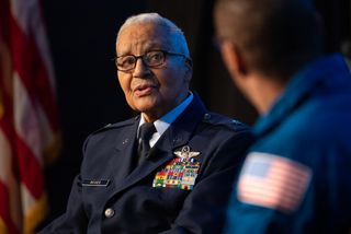 Retired U.S. Air Force Honorary Brig. Gen. Charles McGee speaks with NASA astronaut Alvin Drew during a Black History Month program titled "Trailblazers, The Story of a Tuskegee Airman," on Feb. 5, 2020, at NASA Headquarters in Washington.