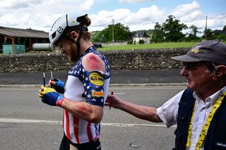 Lidl Treks US rider Quinn Simmons receives medical assistance after crashing during the 5th stage of the 110th edition of the Tour de France cycling race 163 km between Pau and Laruns in the Pyrenees mountains in southwestern France on July 5 2023 Photo by Marco BERTORELLO AFP Photo by MARCO BERTORELLOAFP via Getty Images
