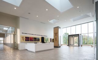 Modern entrance to arts and cultural centre with reception desk