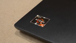 An AMD Ryzen 5 sticker on the keyboard deck of the Lenovo Thinkpad C13 Yoga Chromebook