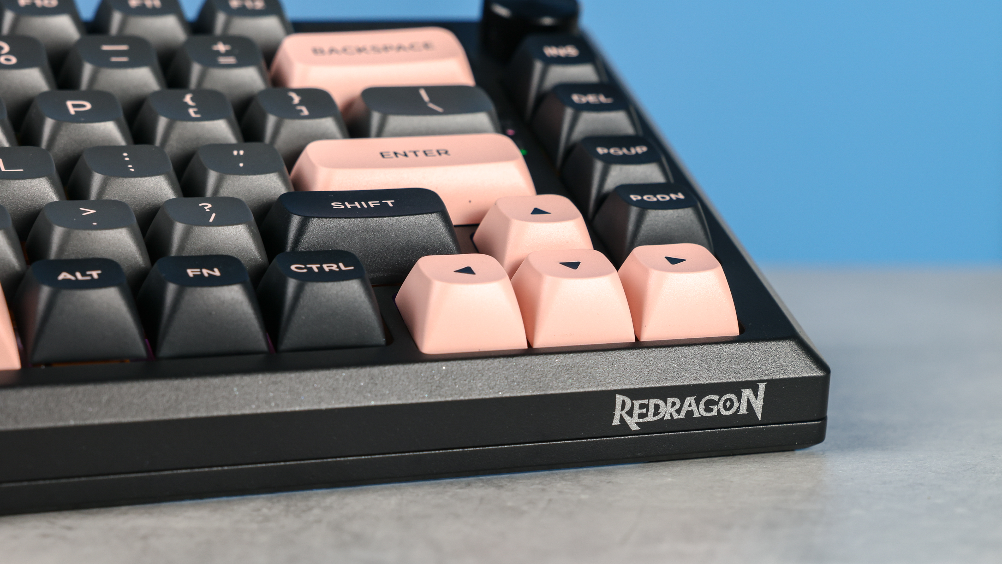 Redragon Eclipse K720 Pro photographed in front of a blue background.