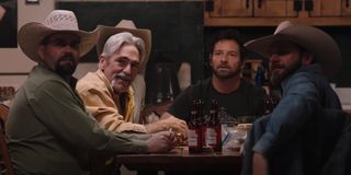 lloyd, ryan and other ranch hands in the bunkhouse on yellowstone season 3