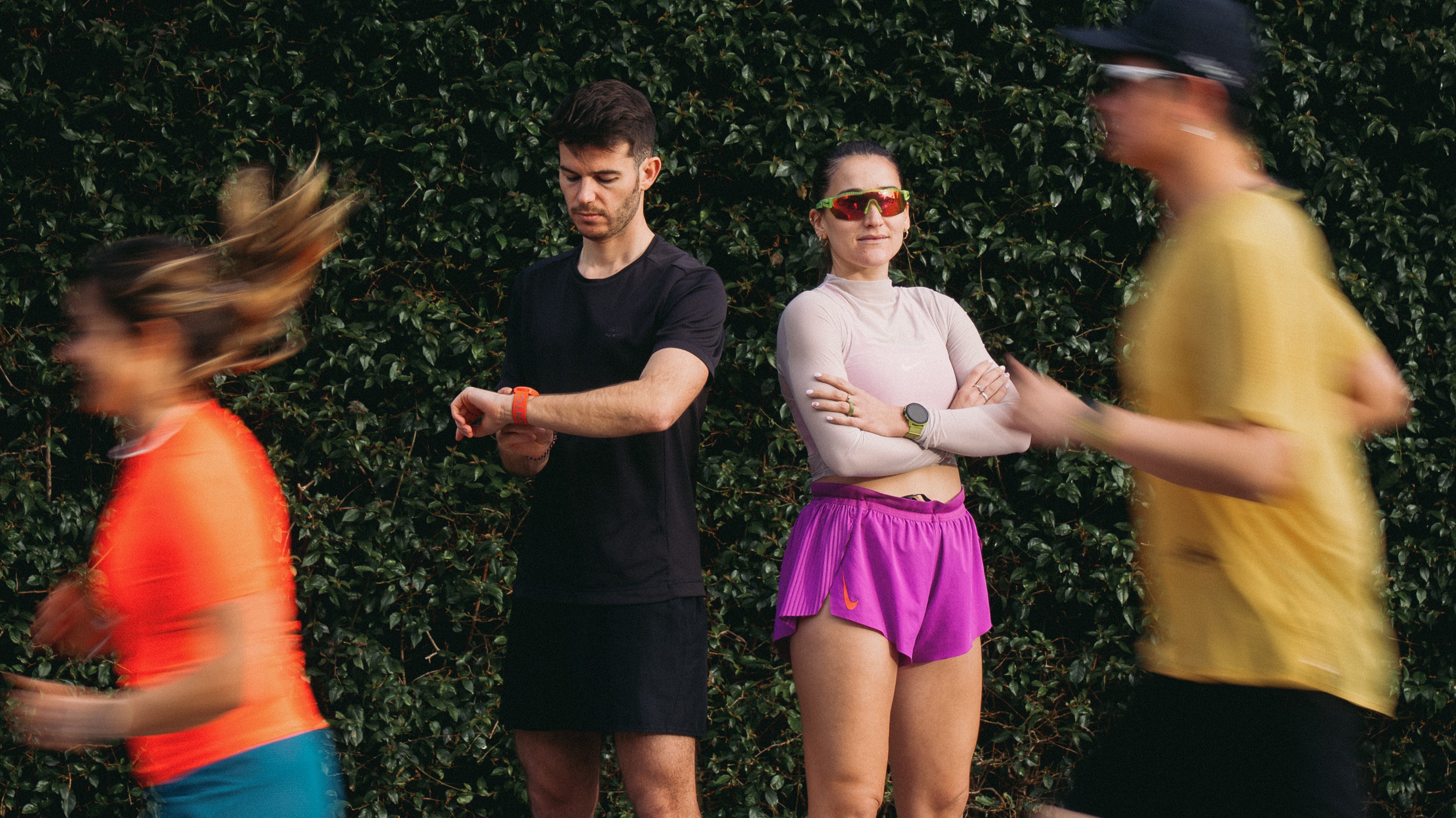 Press image showing runners wearing the Suunto Run watch