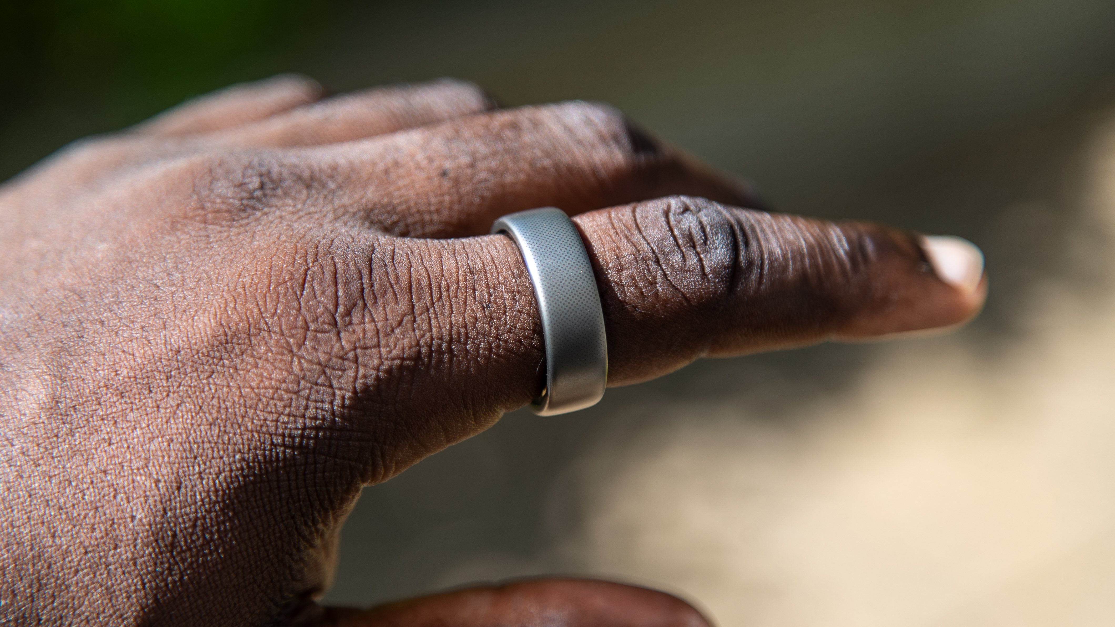 The Amazfit Helio Ring on a finger