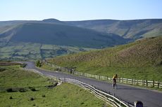 Cyclist climbing the Mam Tor climb