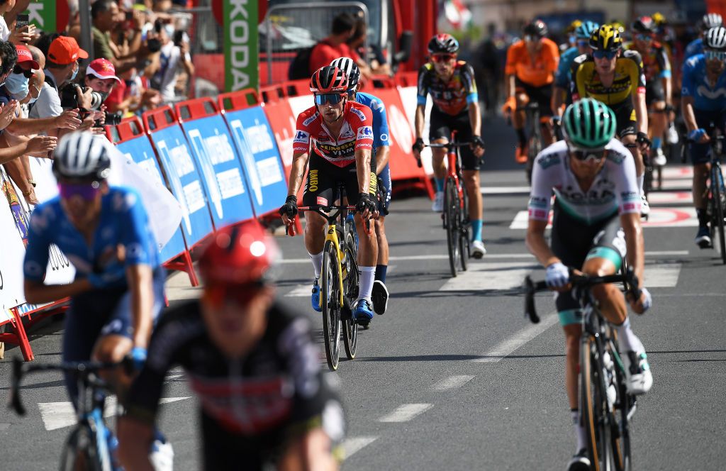 MONFORTE DE LEMOS SPAIN SEPTEMBER 03 Primoz Roglic of Slovenia and Team Jumbo Visma red leader jersey crosses the finishing line during the 76th Tour of Spain 2021 Stage 19 a 1912 km stage from Tapia to Monforte de Lemos lavuelta LaVuelta21 on September 03 2021 in Monforte de Lemos Spain Photo by Tim de WaeleGetty Images