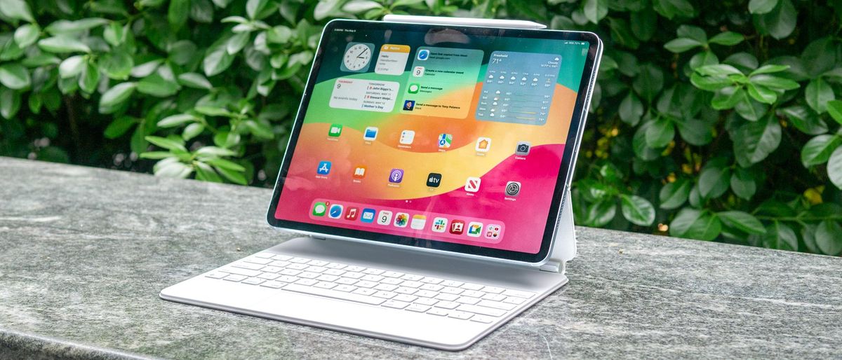 Apple 13-inch iPad Air 2024 shown with Magic Keyboard