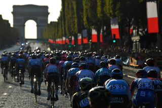 The peloton racing in Paris, stage 21 at the Tour de France