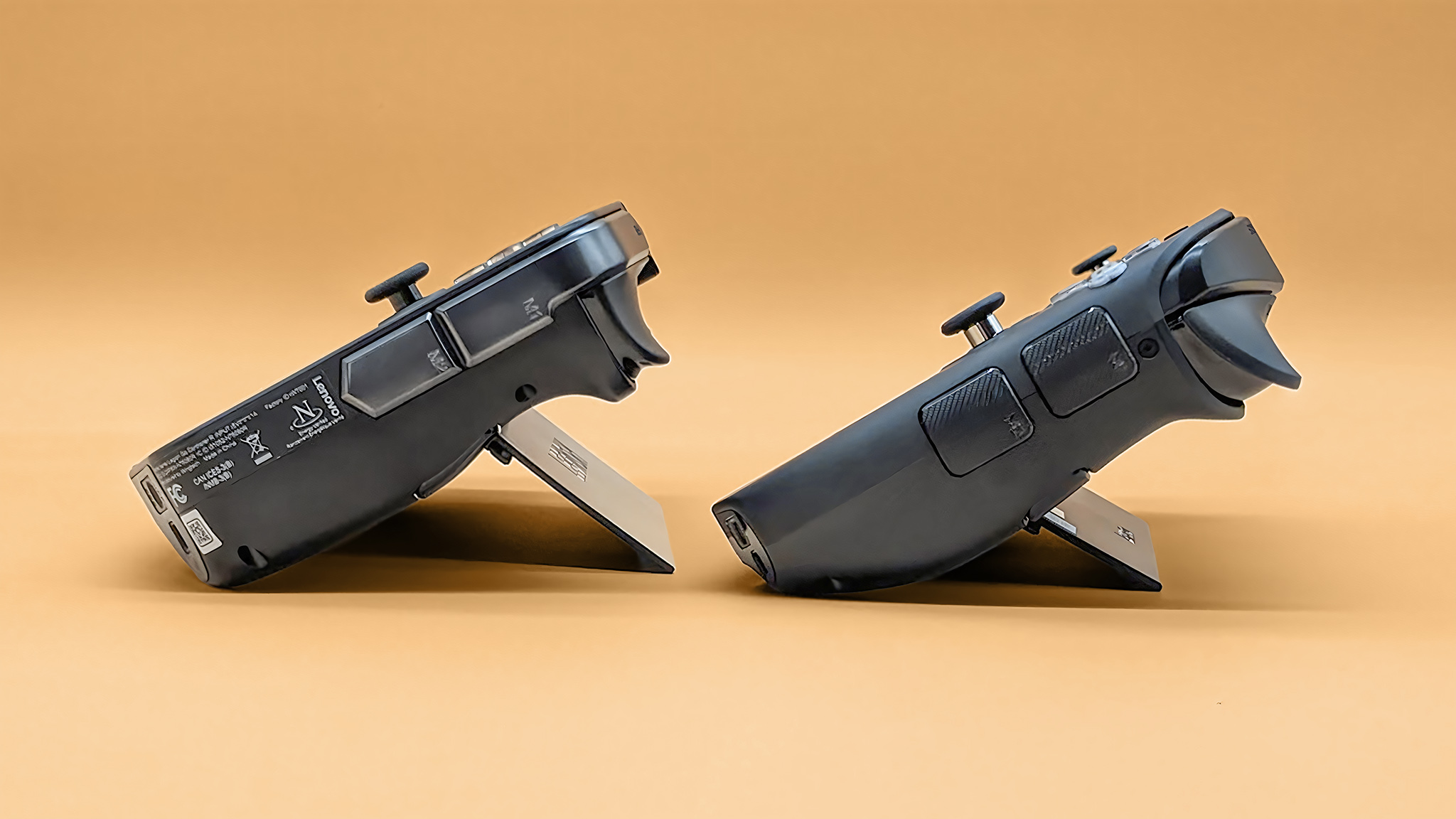 A profile view of the Lenovo Legion Go 2 and original Legion Go leaning back on their kickstands.