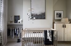 Neutral nursery with wooden furniture