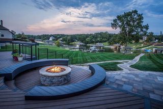 A sunken firepit with a stunning landscape