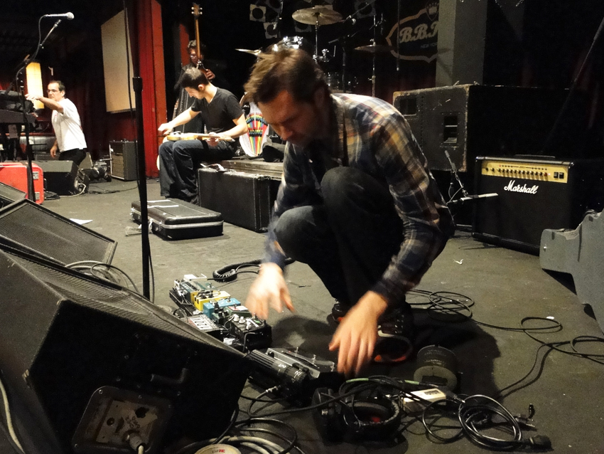 Paul Gilbert sets up his pedalboard and wonders what happened to his guitar tech