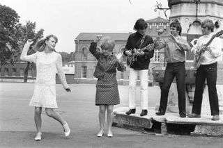 On the set of the movie To Sir, With Love in 1966 with actress Judy Geeson, singer Lulu and The Mindbenders – Eric Stewart, Ric Rothwell and Bob Lang
