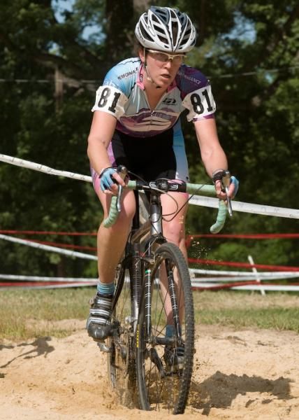 Cara Applegate (Performance Bicycles) drives through the sandpit.