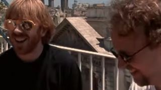 Trey Anastasio wearing orange sunglasses and Page McConnell of Phish being interviewed for Bittersweet Motel