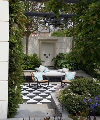 New West End Garden by Kate Gould with paving and living wall
