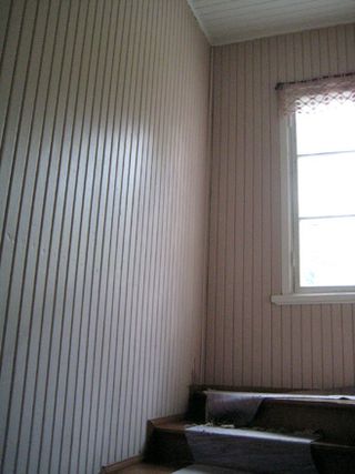 A wooden staircase at the house