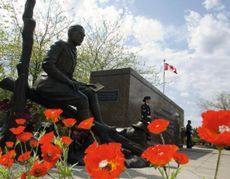 We will remember him: the statue of army surgeon Lt-Col John McCrae, who penned the poem In Flanders Fields, in Ottawa, Canada.