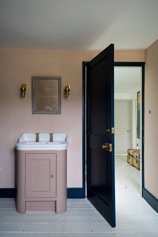 Pale Pink Bathroom with black door