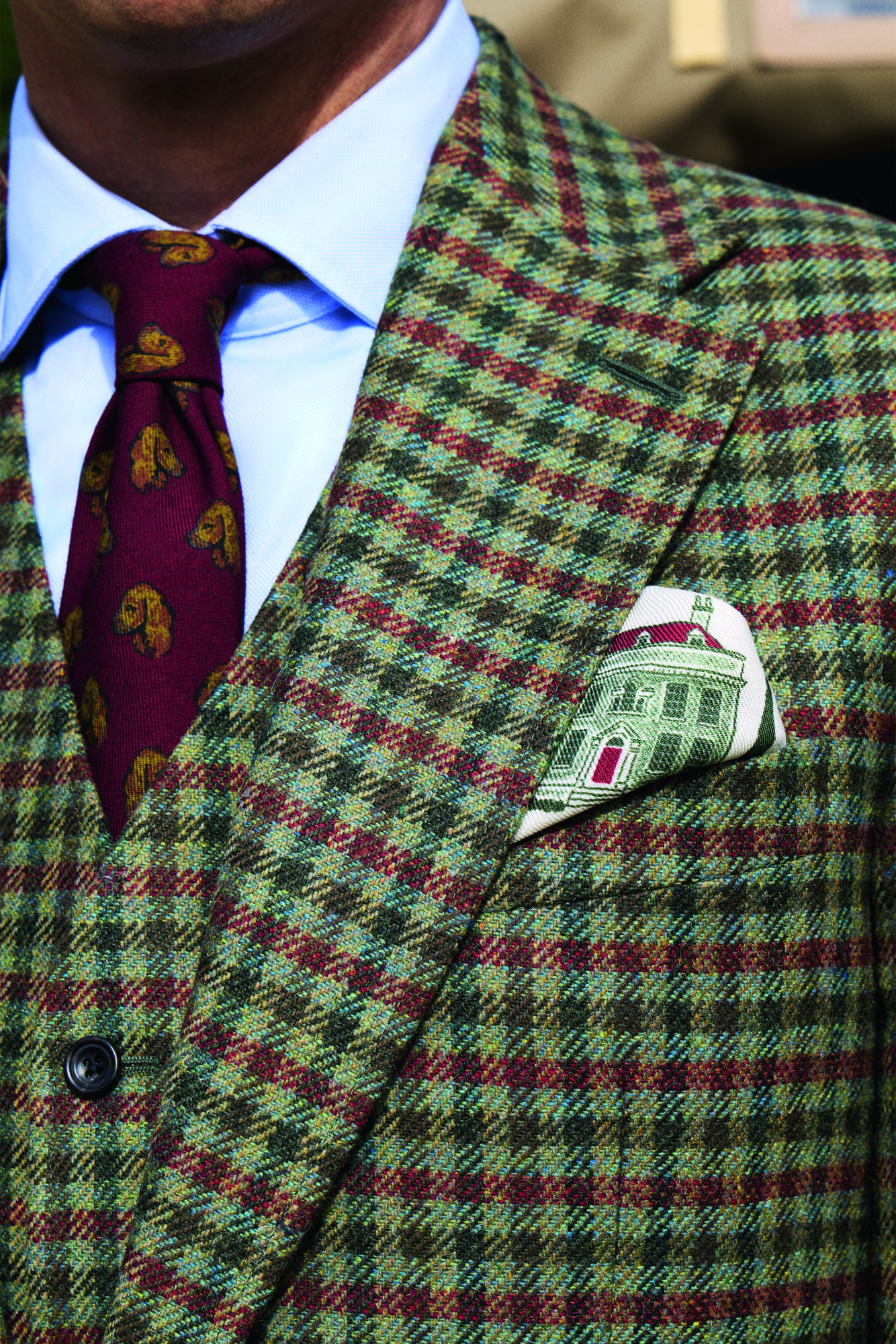 details and shots of the new Country Life tweed, a delightful red and green creation