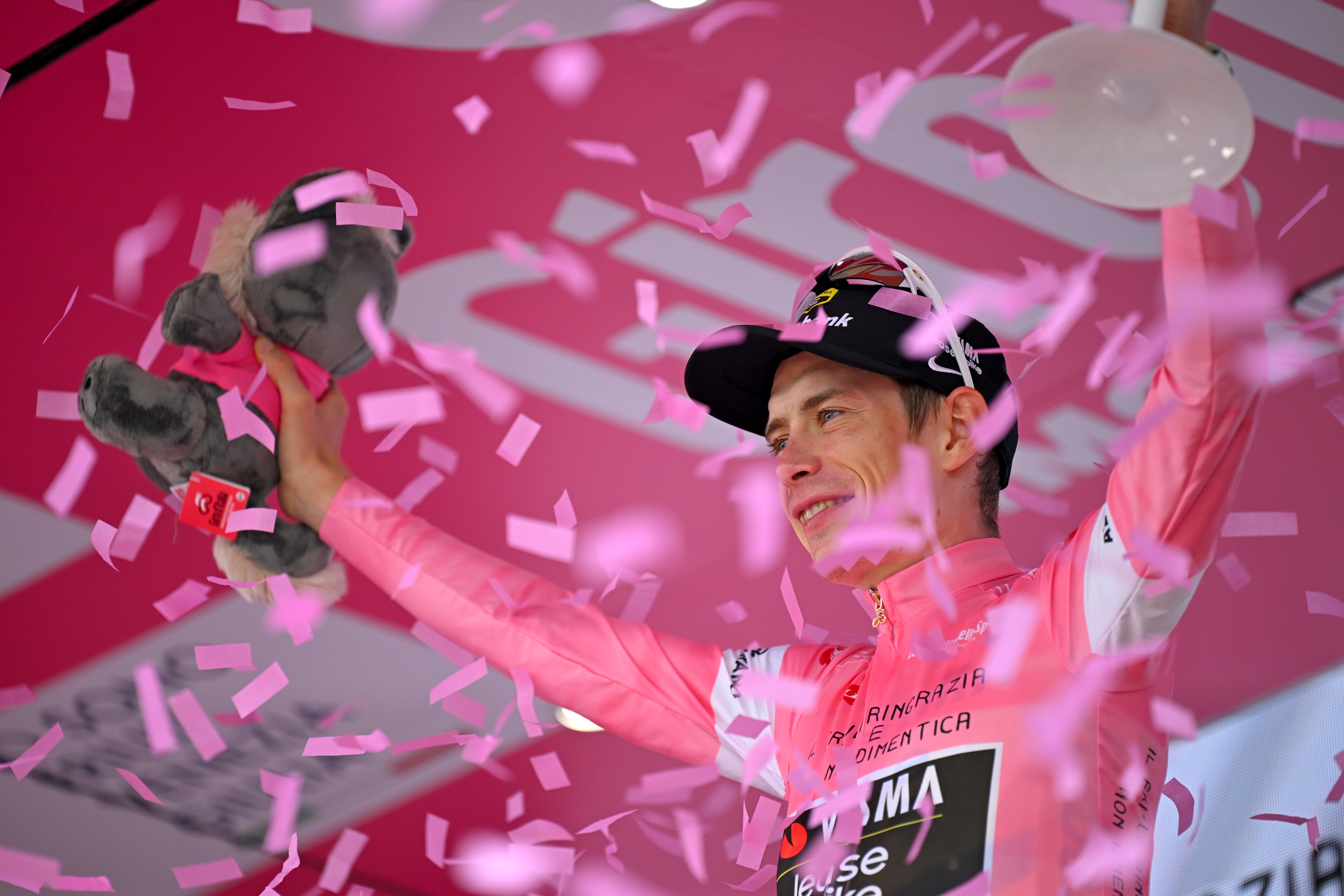 Jonas Vingegaard wears pink after winning stage 20 of the 2026 Giro d'Italia