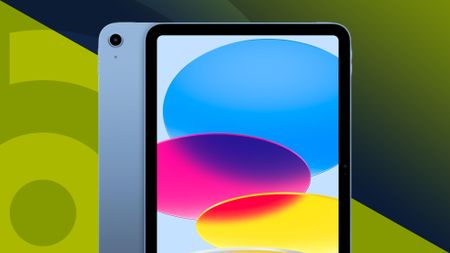 The Apple iPad 11-inch (2025) on a green background