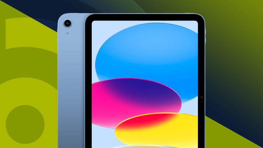 The Apple iPad 11-inch (2025) on a green background