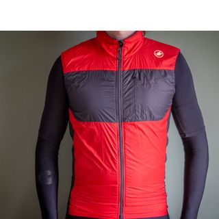 Castelli Unlimited Puffy Vest in red and black pictured against a plain grey background