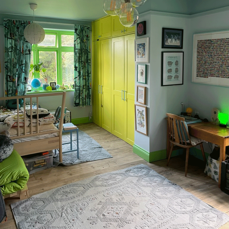 Teenage boys bedroom with rugs and neon green accents