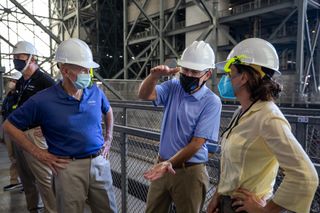 (From left to right), NASA Administrator Bill Nelson, associate administrator Bob Cabana and NASA chief of staff Susie Perez Quinn tour the Vehicle Assembly Building (VAB) at NASA's Kennedy Space Center in Florida. The trio visited the agency's Space Launch System (SLS) megarocket as they prepare for the first launch of the Artemis program, which aims to return humans to the lunar surface. Today, at Space Launch Complex 41, NASA's Commercial Crew Program partner Boeing was set to launch its Starliner spacecraft on the uncrewed OFT-2 test flight. However, an issue with valve placement within the craft's propulsion system caused the flight to be delayed. The next available launch date is tomorrow (Aug. 4).