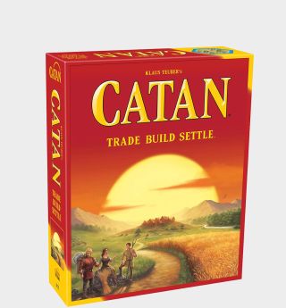 The Catan game box on a plain background