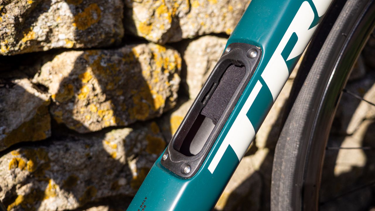 Trek Domane SLR 9 leaning against a stone wall